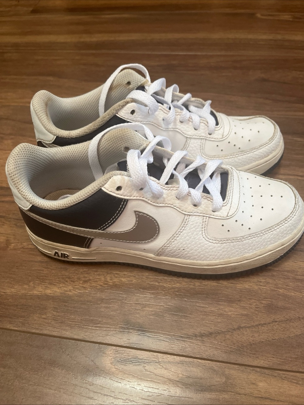 Nike White and Black Low-Top Sneakers with Gray Swoosh